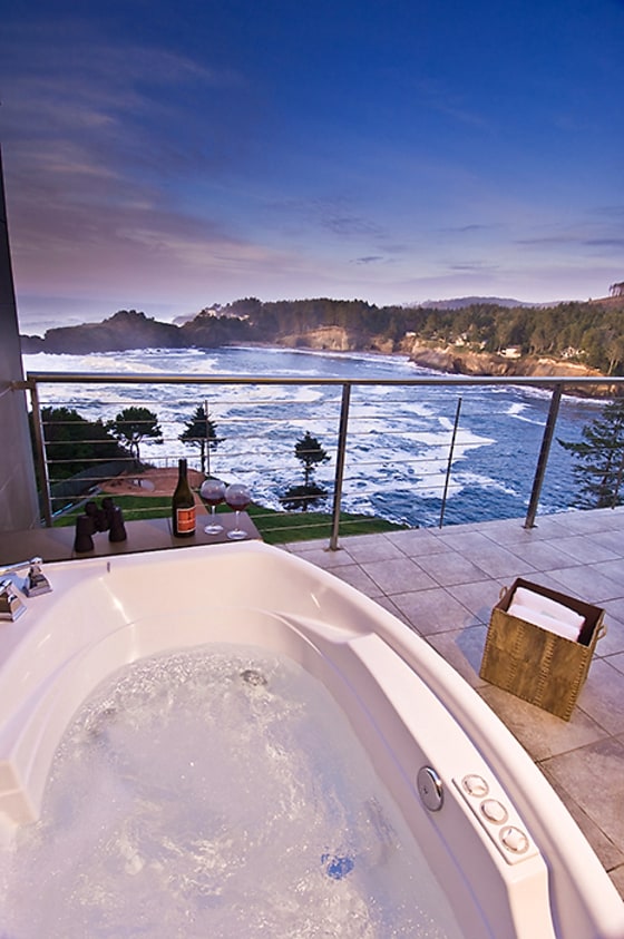 Watch bald eagles, gray whales, and distant ocean storms from the terrace in your suite at the Whale Cove Inn in Depoe Bay, Oregon.